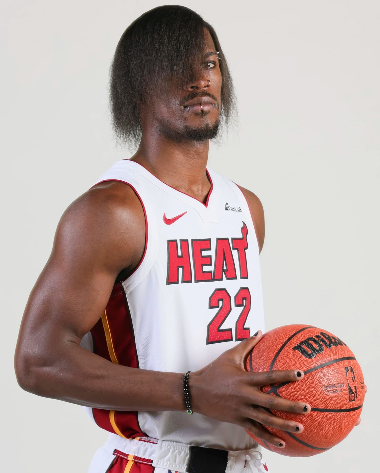 Jimmy Butler in a Miami Heat number 22 jersey.